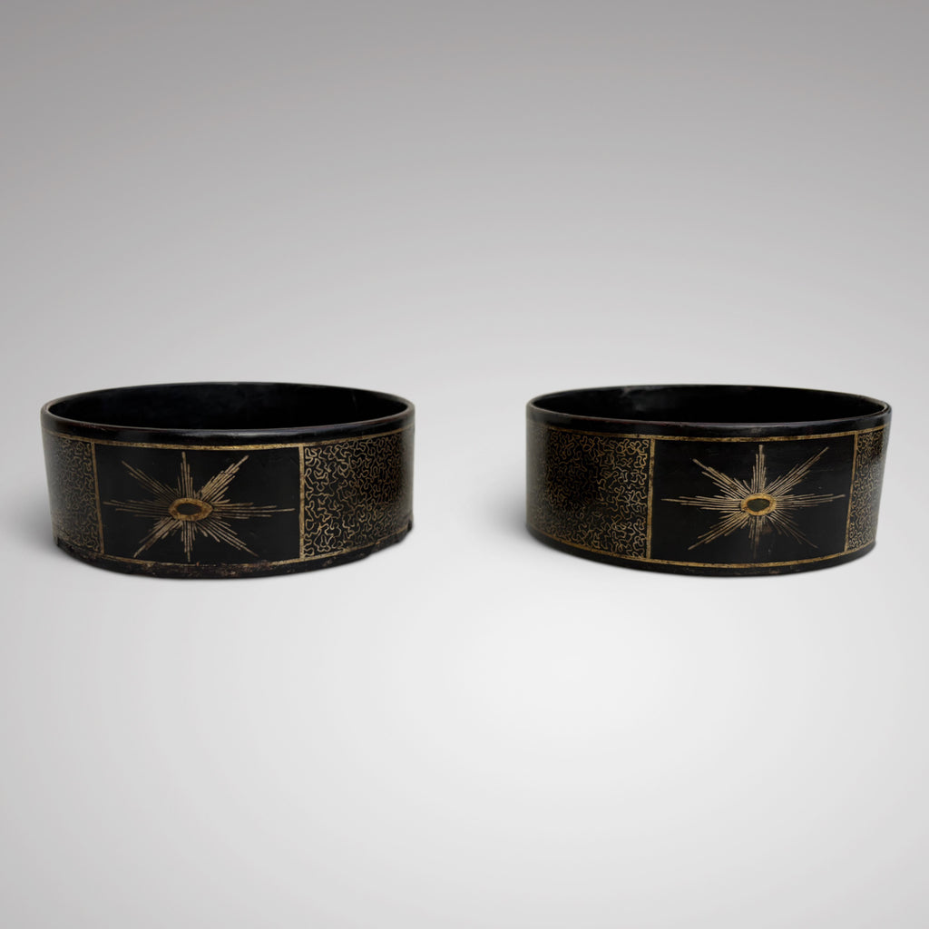 A Pair of Regency Papier Mache Wine Coasters