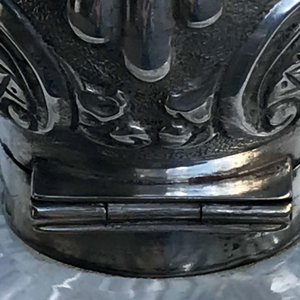 A Pair of Antique Silver Topped Scent Bottles