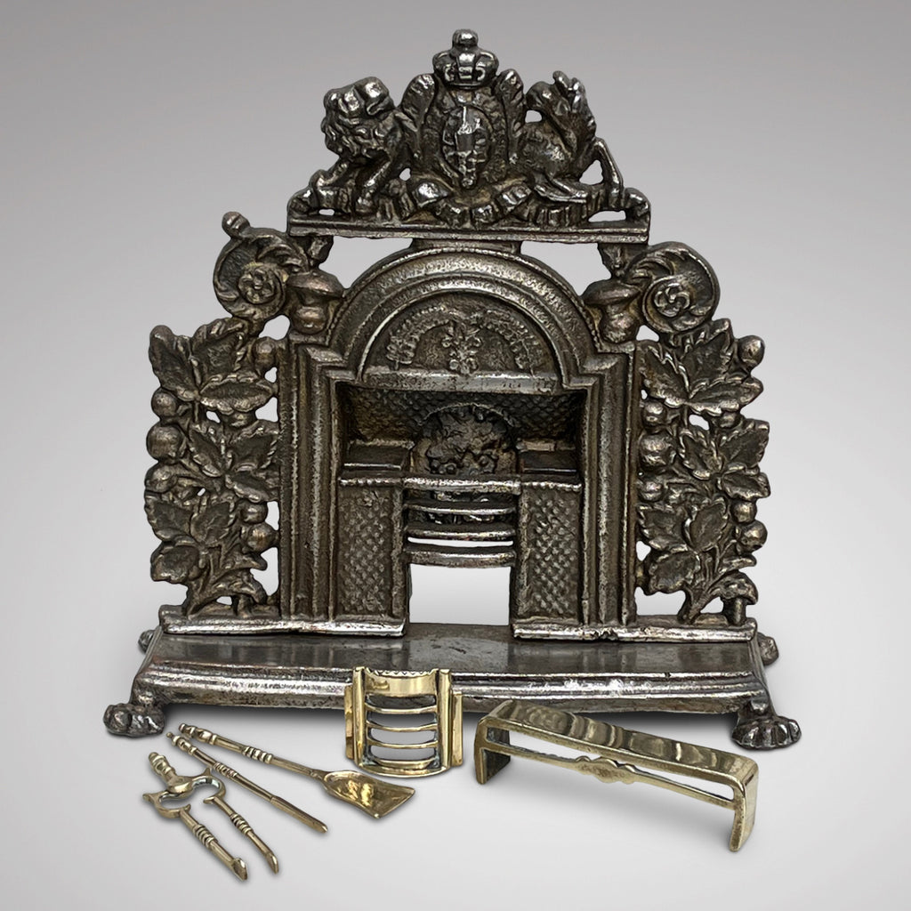 19th Century Cast Iron Miniature Fireplace with Brass Fire Irons - Main View - 2