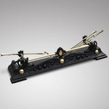 Aesthetic Period Cast Iron Fender with Brass Fire Irons - Main View - 1
