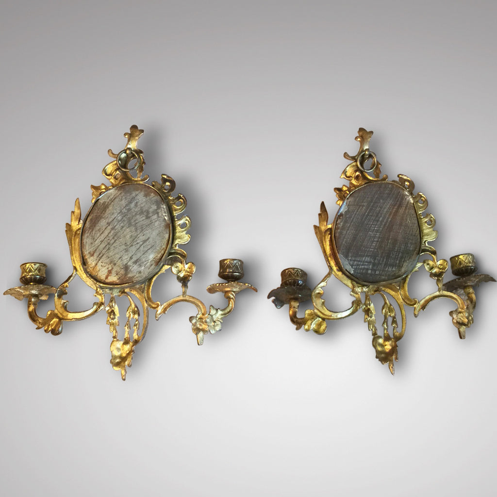 A Pair of 19th Century Gilt Metal Girandoles - View of back of mirrors