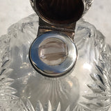 A Pair of Antique Silver Topped Scent Bottles